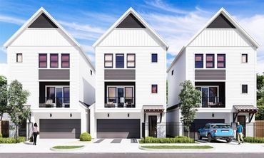 Three modern white houses with garages under a blue sky.