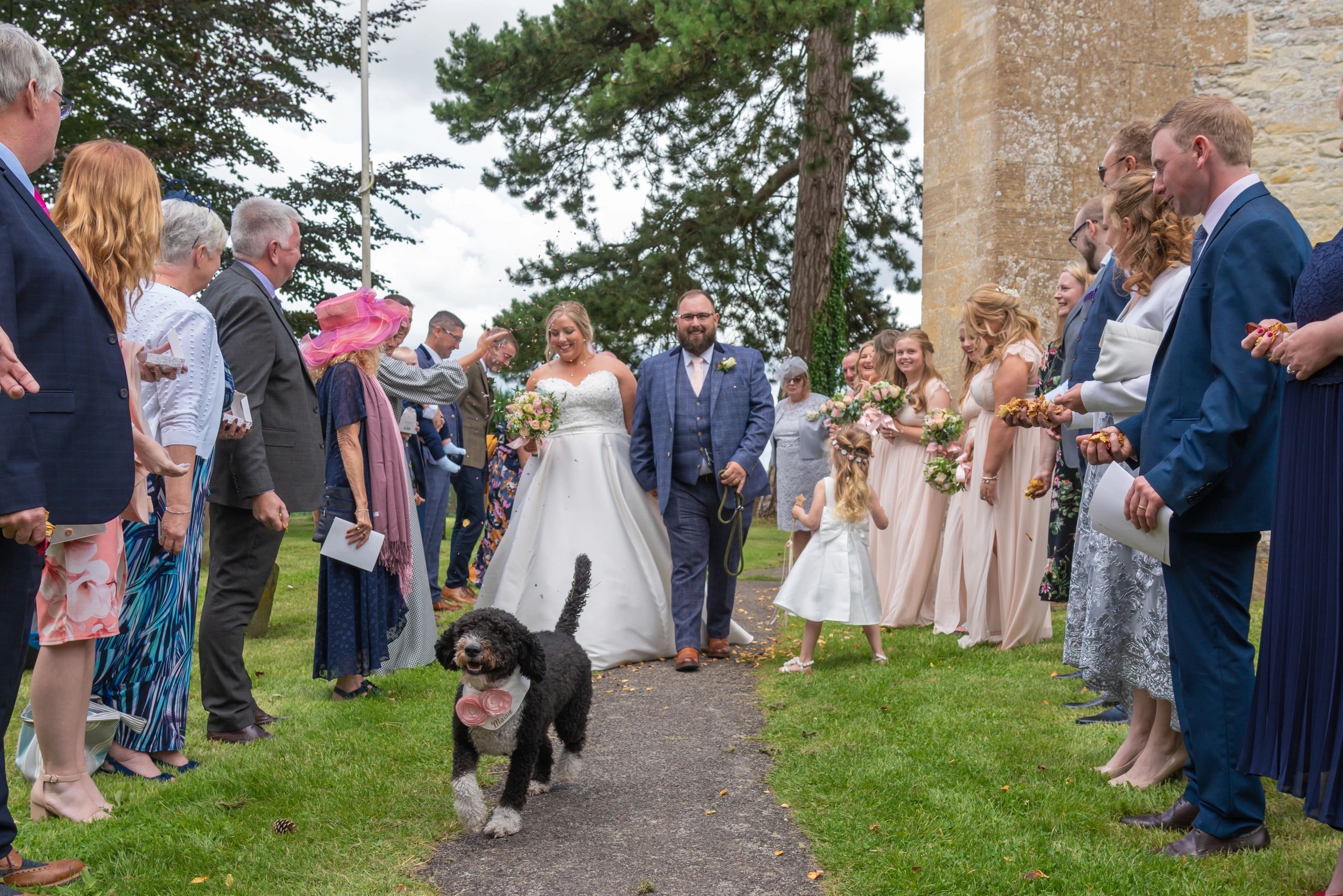 Photograph confetti wedding photographer Laura Miller Photography Oxfordshire wedding photo with dog