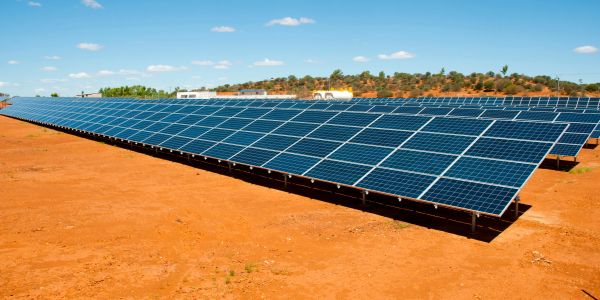 Solar panels in a desert landscape.