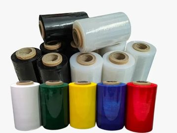 Various colored and clear plastic wrap rolls arranged together.