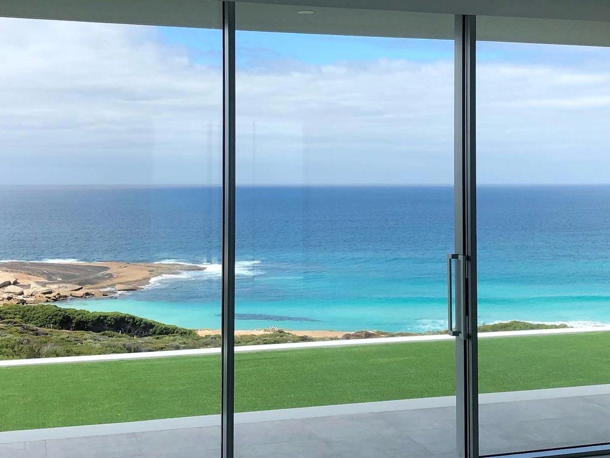 Frameless Sliding Door System with Minimal Frame and Maximum View. Esperance. Western Australia.