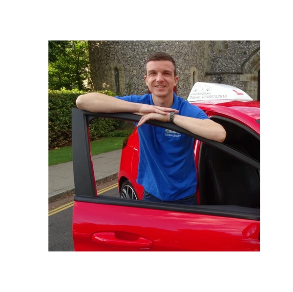 Driving Instructor Standing next to his car