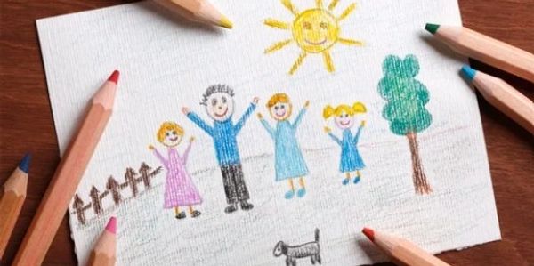 Crayon drawing of a happy family outdoors with sun, tree, and dog.
