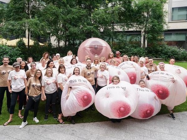 Group picture of males and females sharing charitable organization against breast cancer