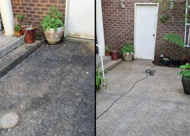 Before and after of courtyard pressure wash
