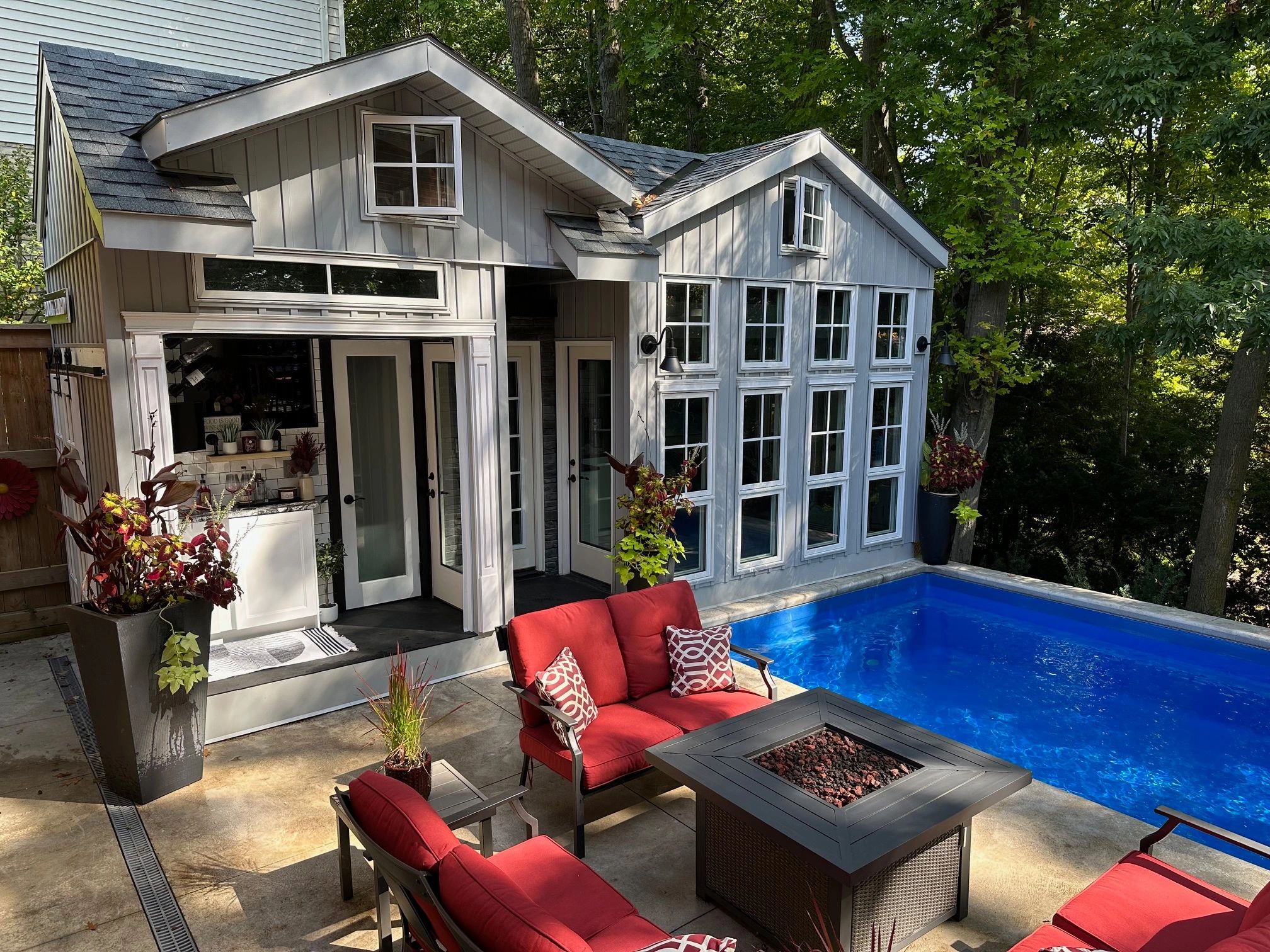 Modular image of a Button House situated beside a pool