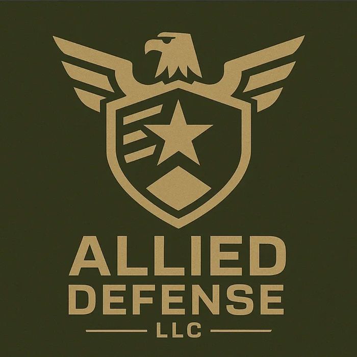 Golden eagle emblem with star and diamond, Allied Defense LLC logo on dark background.