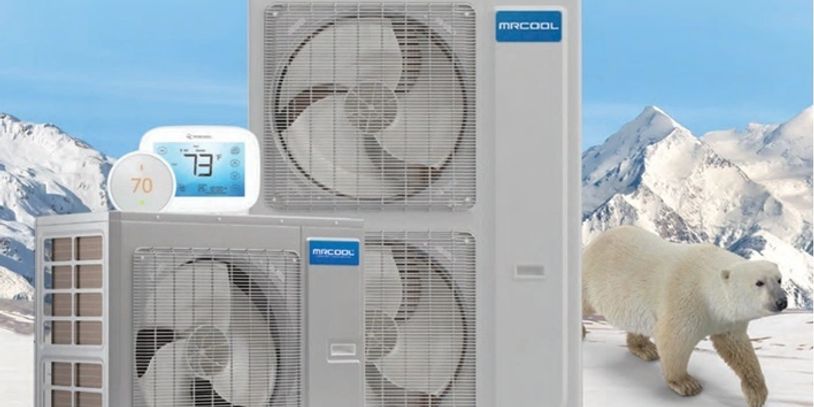Air conditioning units branded MRCOOL with a polar bear and snowy mountains in the background.