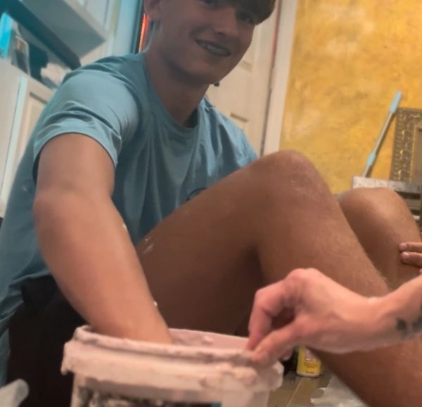 My son’s best buddy molding a football fist