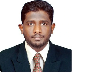 Professional portrait of a man in a suit and tie.