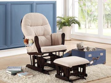 Cream cushioned rocking chair with matching footstool in a cozy room.