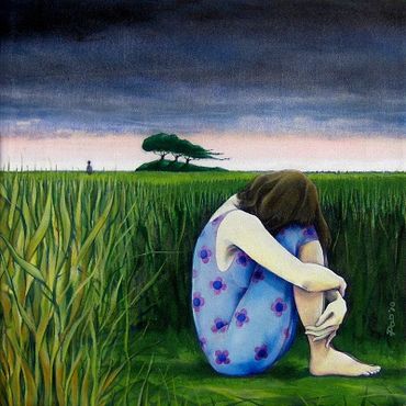Young woman sitting in  a field of long grass. Heavy black skies overhead.
