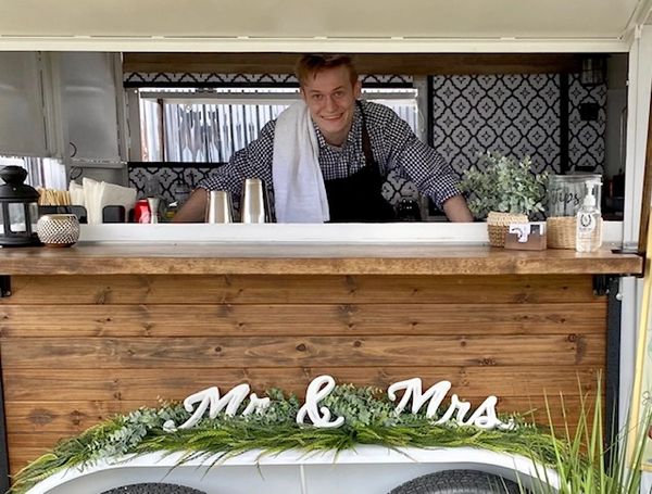 horse trailer bar with bartender