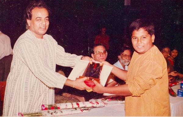 Sutanu Sur receiving Award for his top Tabla performance at National Cultural Association in 1999