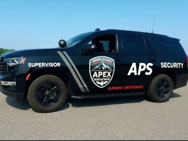 Black security SUV labeled 'APEX APS' with 'Armed Response' text on side.