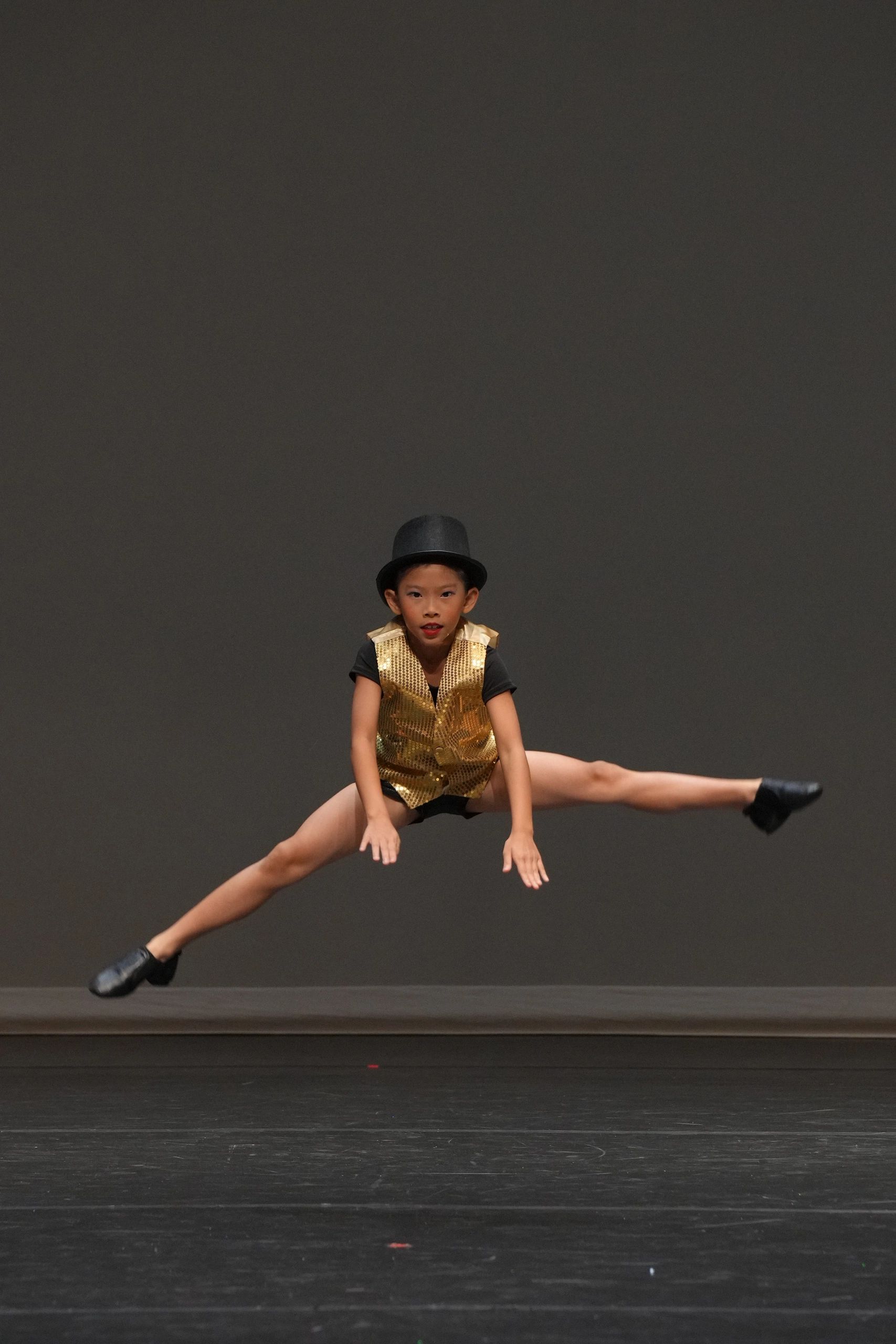 Girl doing straddle jump