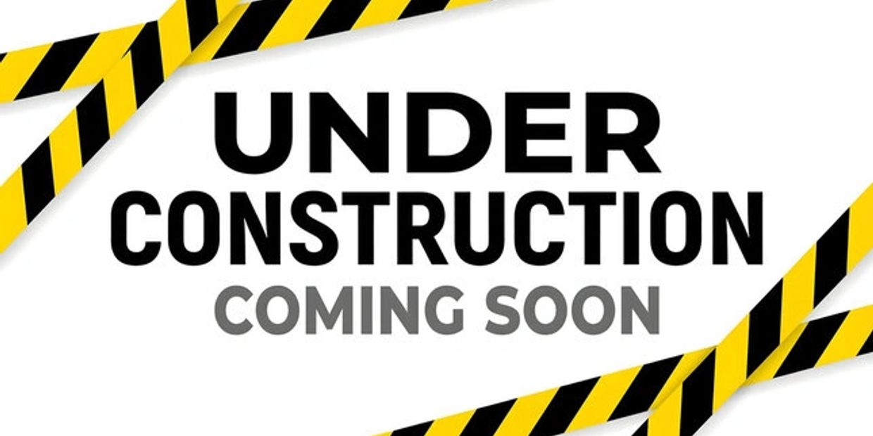 Under construction sign with caution tape.