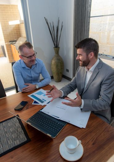 promotional marketing photo of business consultant with client