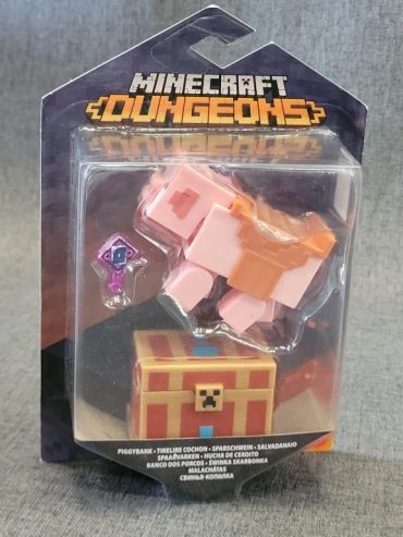Minecraft Dungeons piggybank and treasure chest toy set in packaging.