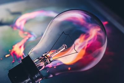 Fiery lightbulb indicating new ideas