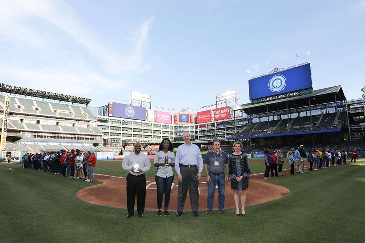 Brownstone Associates receives honor  during Jackie Robinson Day at Globe Life Park in Arlington.  