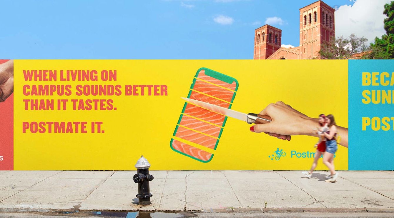 postmates ad of hand model slicing through raw fish with knife