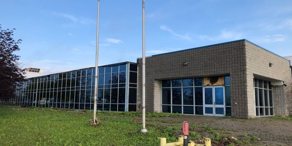 Commercial window tinting in Windsor Ontario on office building