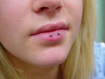 Horizontal lip piercing  price