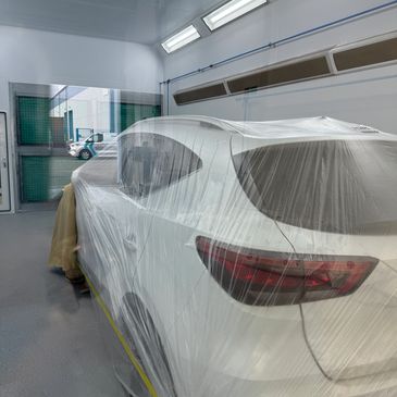 Using high quality materials in our state of the art spray booth at Manchester Body Repairs
