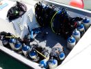 Diving gear with oxygen tanks and masks.