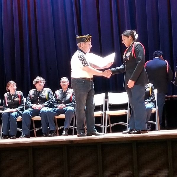 Sergeant-at-Arms: Ray Short given an Award to A ROTC student from Skyline H.S.