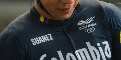 Cyclist wearing Colombia Olympic team uniform with name Suarez.