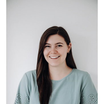 Chiropractor smiling in headshot.