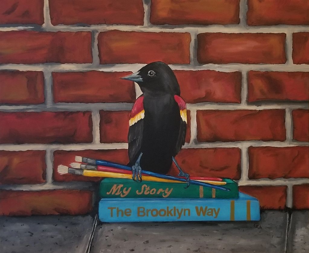 Red-winged Blackbird stack of books my story the Brooklyn way brick wall sidewalk  paint brushes