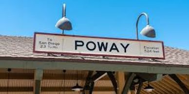 Poway train station platform sign with distance to San Diego and Escondido.