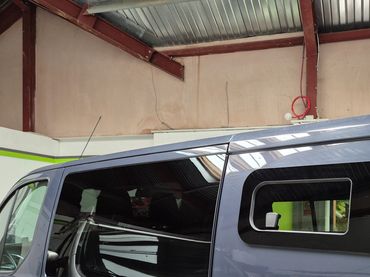 Ford Transit Custom with new side windows fitted in the Sharkbite workshop