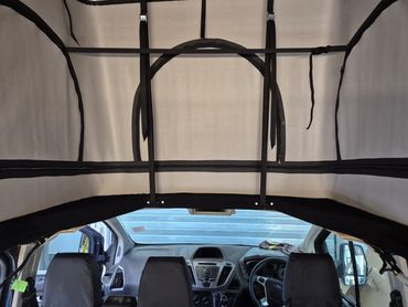 Inside the Skyline pop top canvas on the Ford Transit Custom