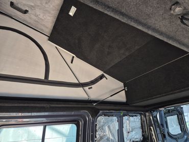 Skyline bi-fold bed in the Ford Transit Custom pop top