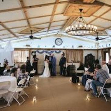 This couple used their own antique doors for the ceremony backdrop