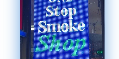 "custom-designed LED signs for SMOKE SHOP."