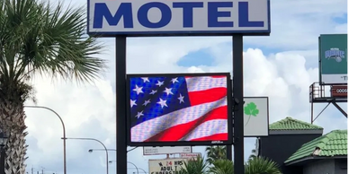 "custom-designed LED sign for Motel to display important info."