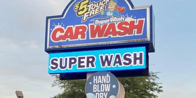 "custom-designed LED signs for car wash."