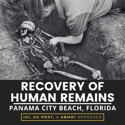Archaeologist uncovering a human skeleton in Panama City Beach, Florida.