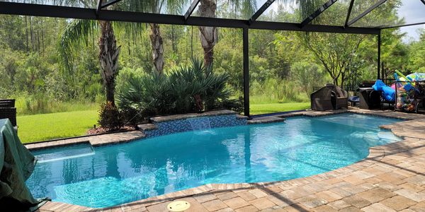 Pool with a water fall feature