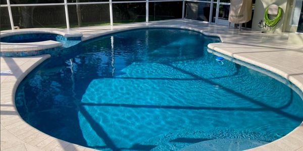 Replaced pool tile that gives the pool out in Tampa a new look for the Tampa Bay Summer.