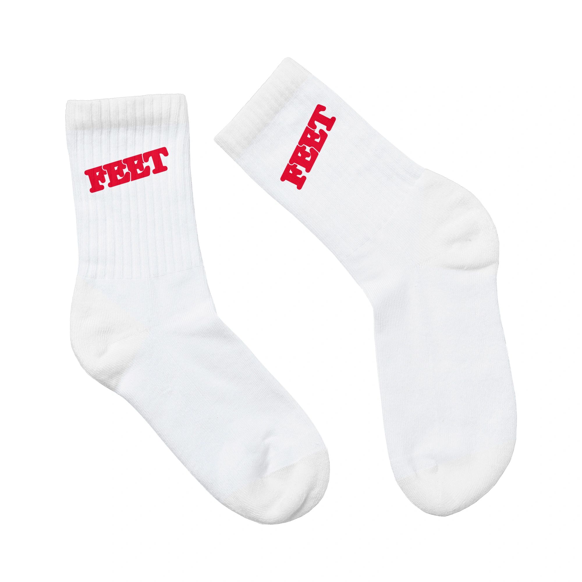 Pair of white socks with the word "FEET" in red letters.