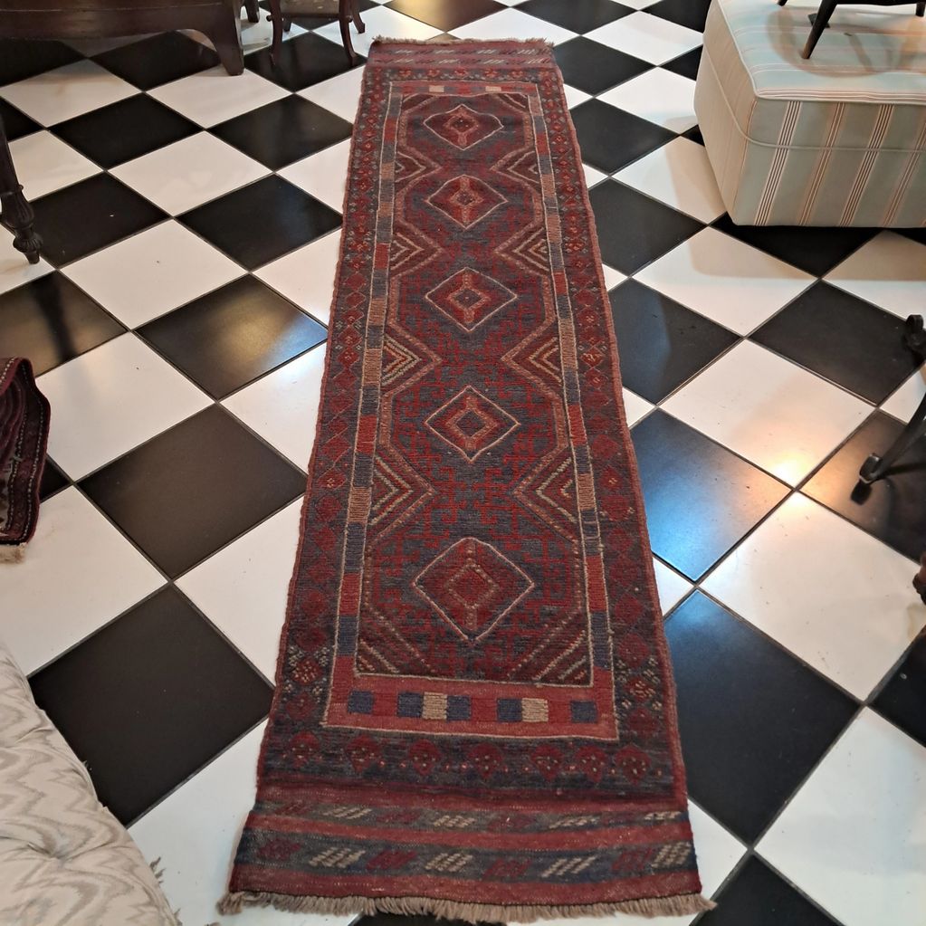 Authentic Afghan tribal runner rug.
