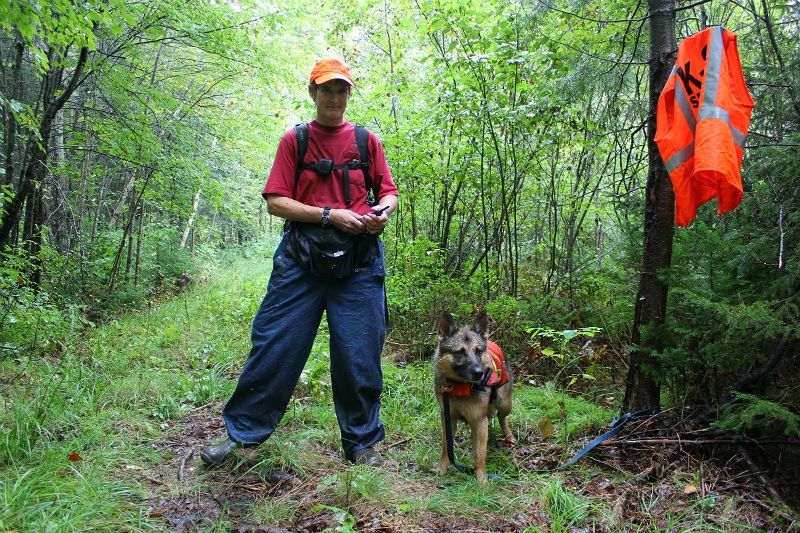 Deborah Palman and K-9 Quinn after locating a missing elderly man in Clinton, Maine