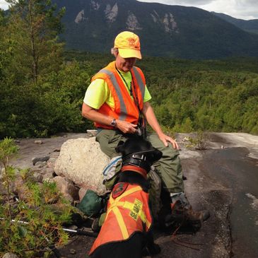 Deb Palman and SAR dog Raven participating in a search in Baxter State Park.