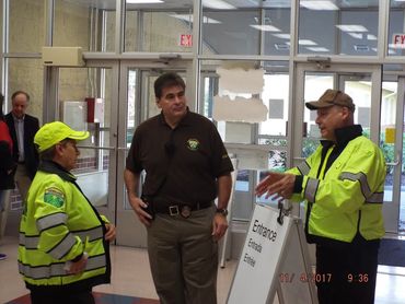 Officer Souza, Capt. Levenson, &  Col. Branconnier at Entrance of MEDS POD